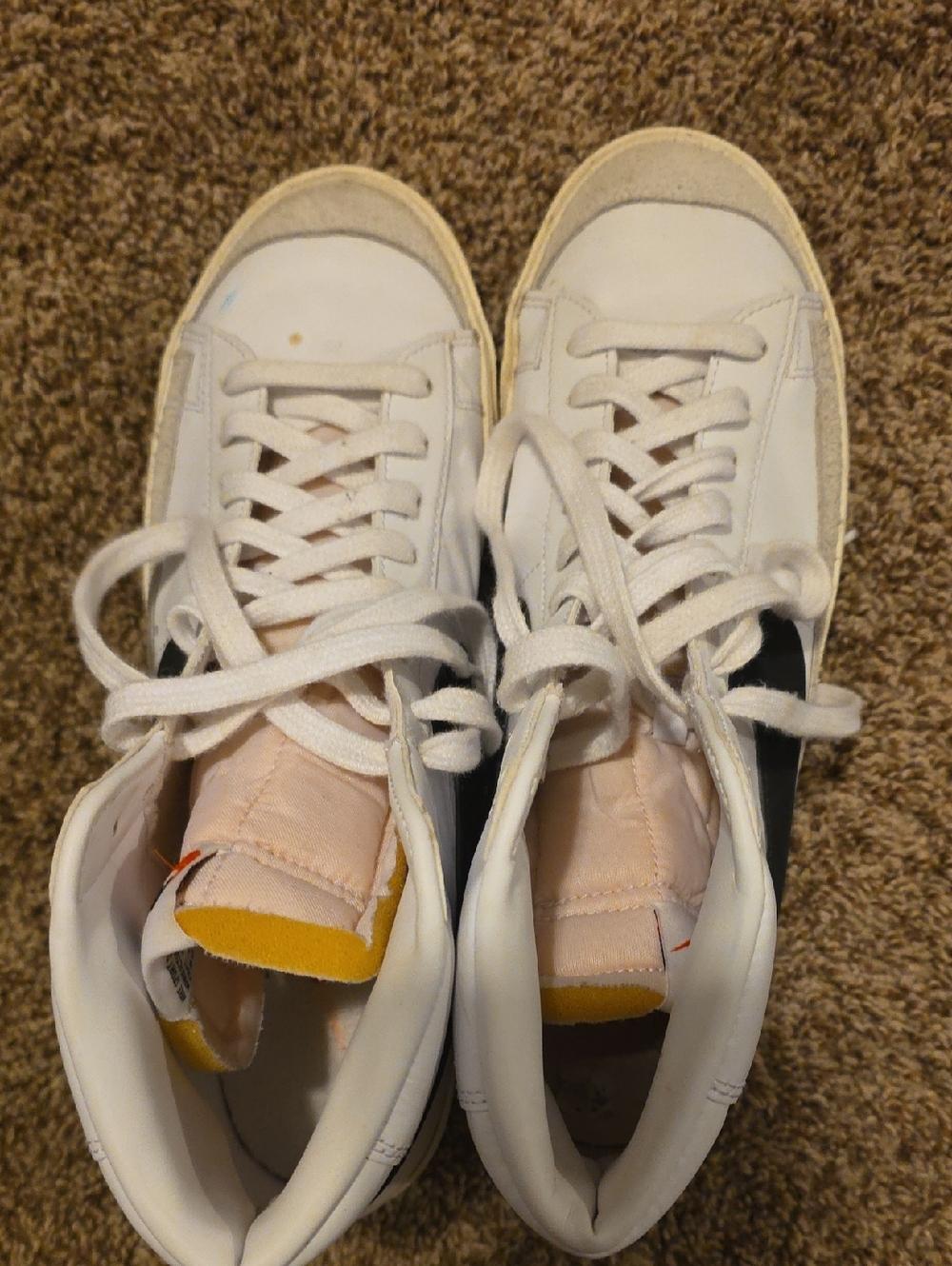 Nike White High-Top Sneakers with Black Swoosh and Pink Tongue Trim